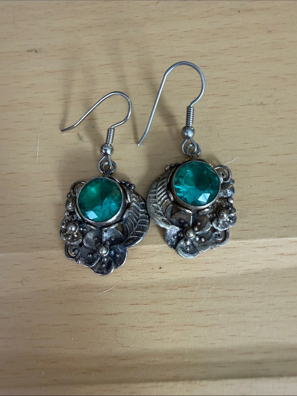 Silver Floral Drop Earrings with Emerald Green Stone